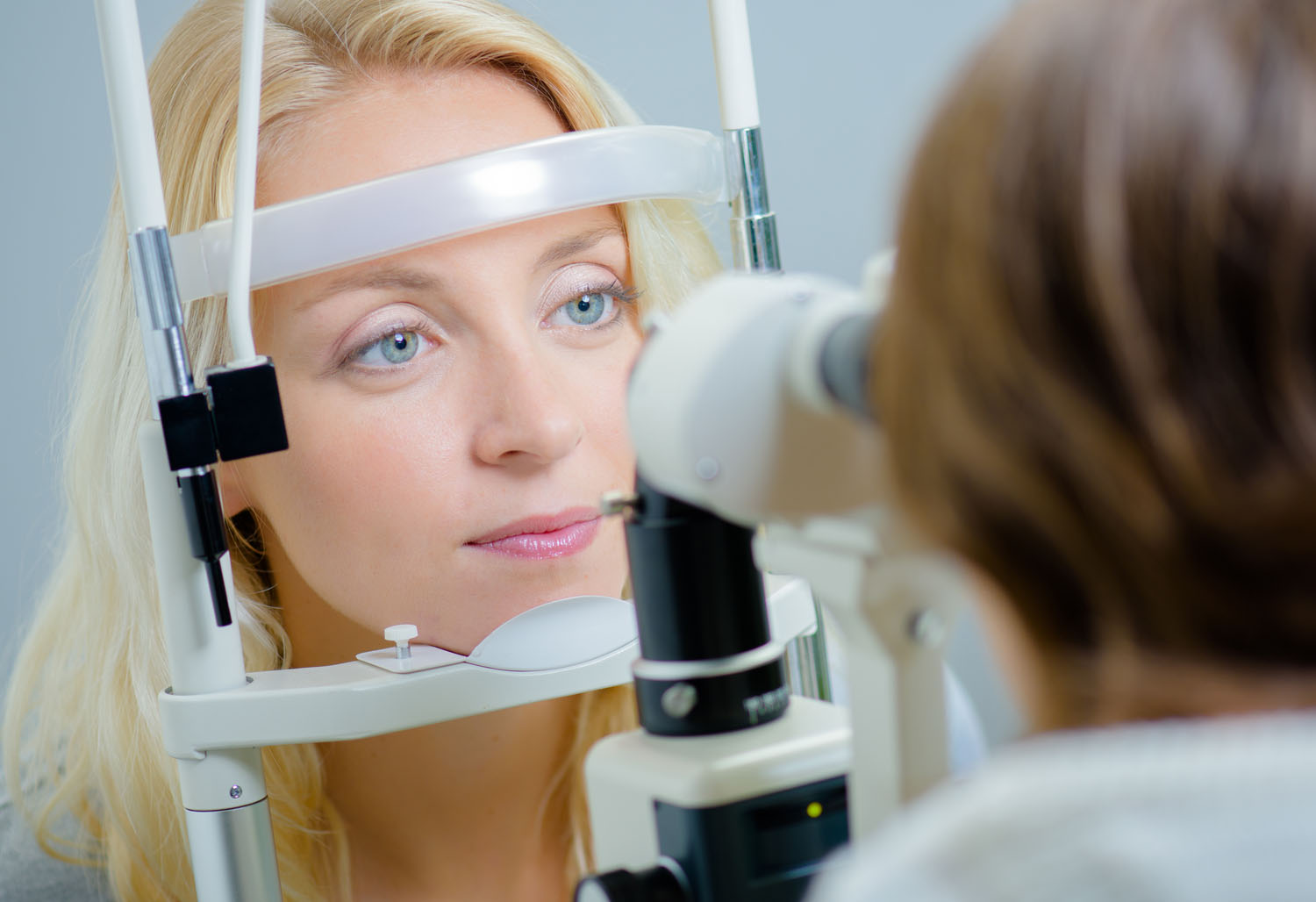 Woman getting an eye exam at Eyecare Specialties