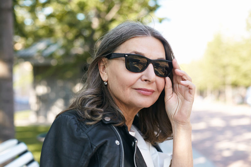 Woman wearing her new sunglasses from eyecare specialties